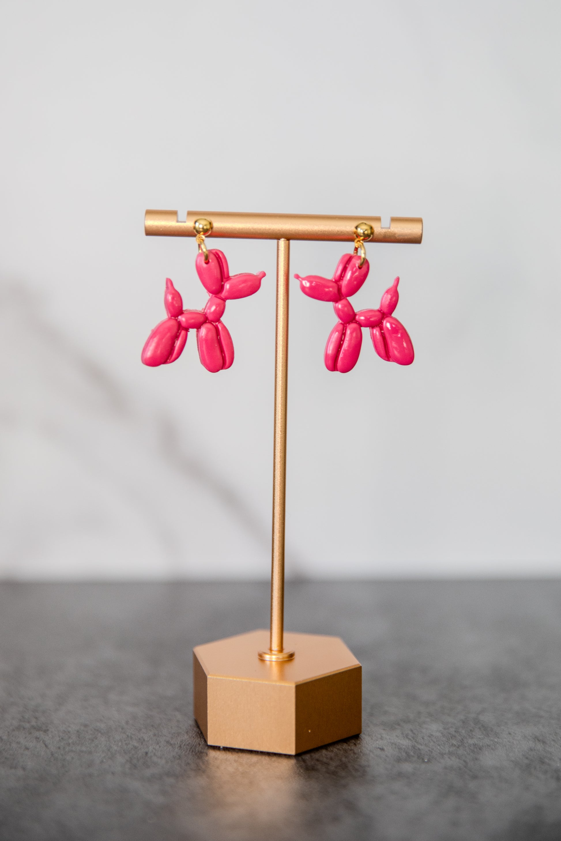Pink balloon dog hanging earrings