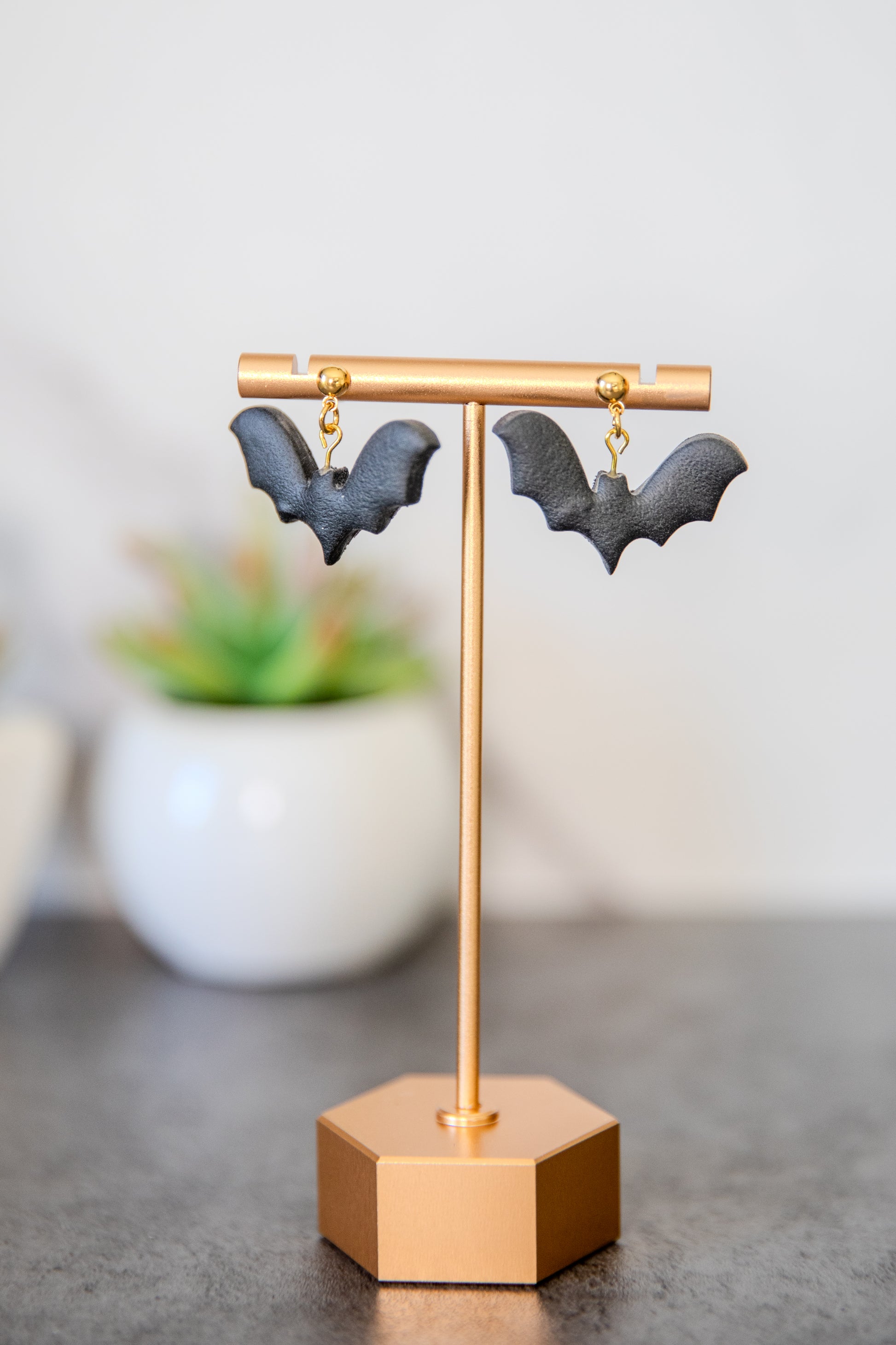 Black bat drop earrings