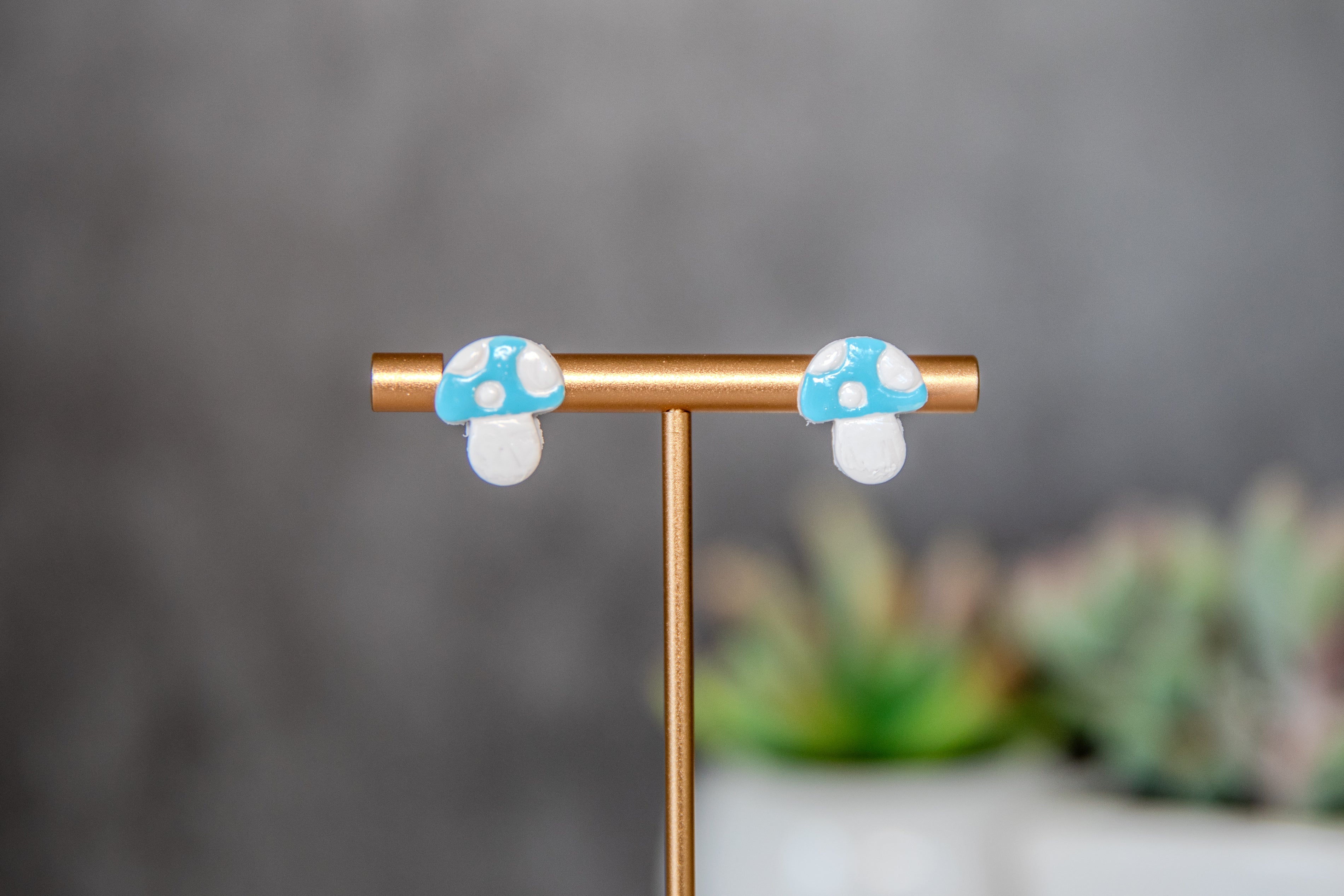Blue colored toadstool stud earrings
