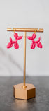 Pink balloon dog hanging earrings