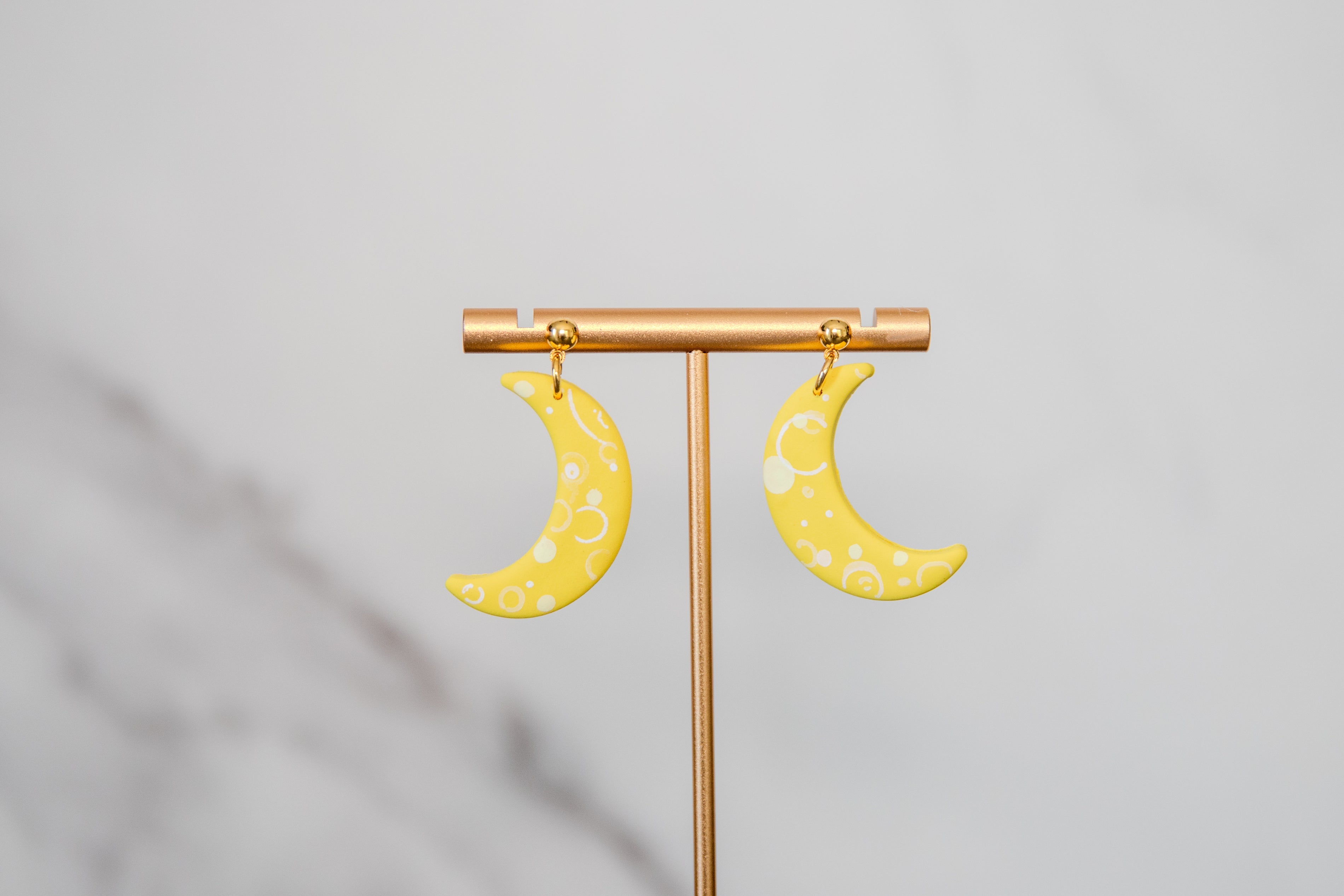 Yellow crescent moon drop earrings