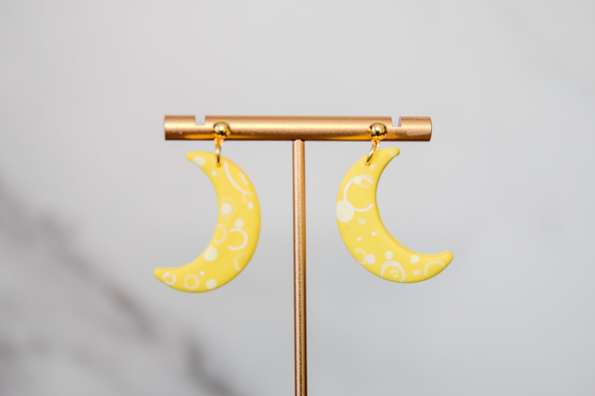Yellow crescent moon drop earrings