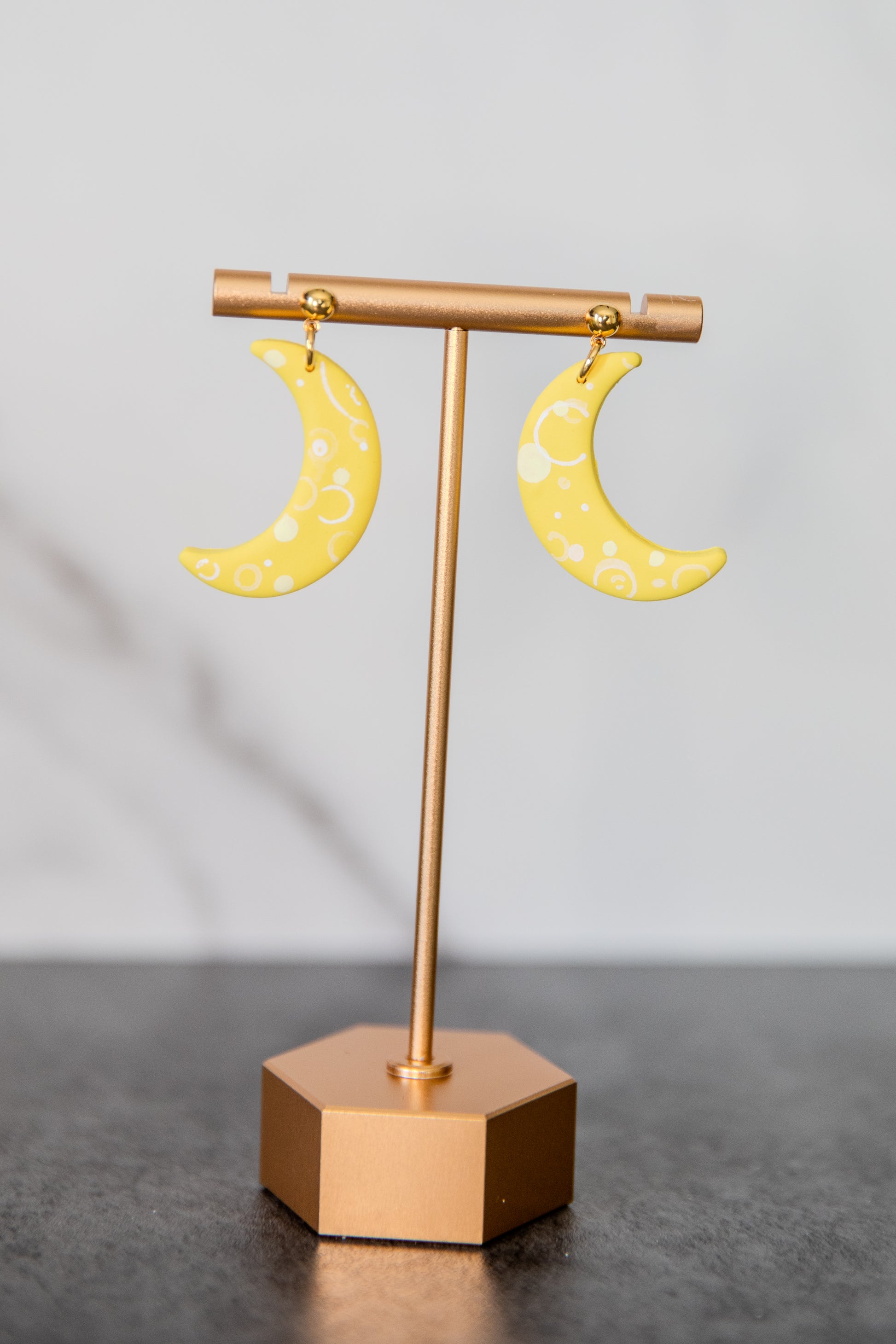 Yellow crescent moon drop earrings