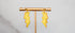 Yellow lightning bolt drop earrings with gold details