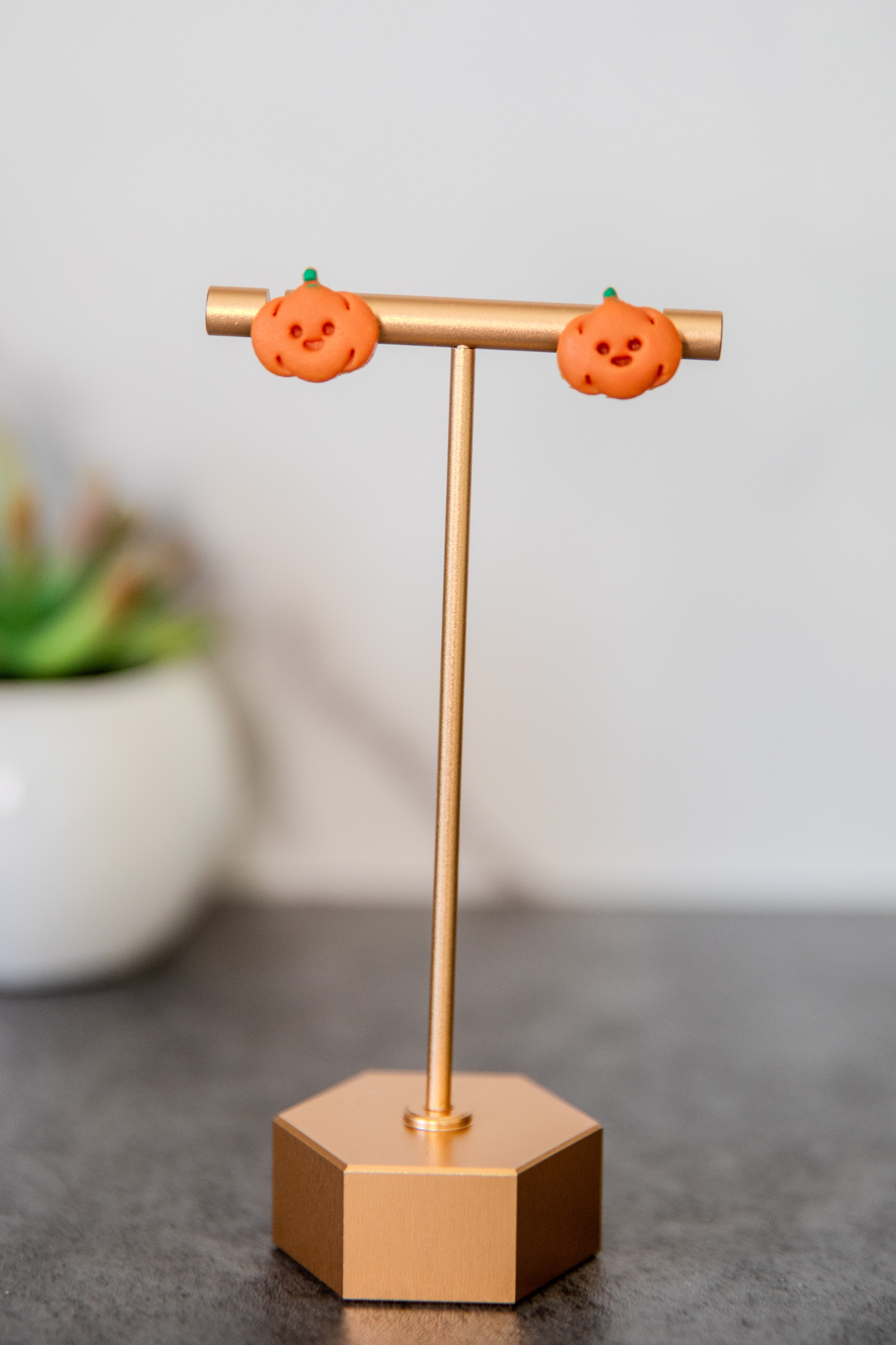Pumpkins with happy face polymer clay autumn stud earrings