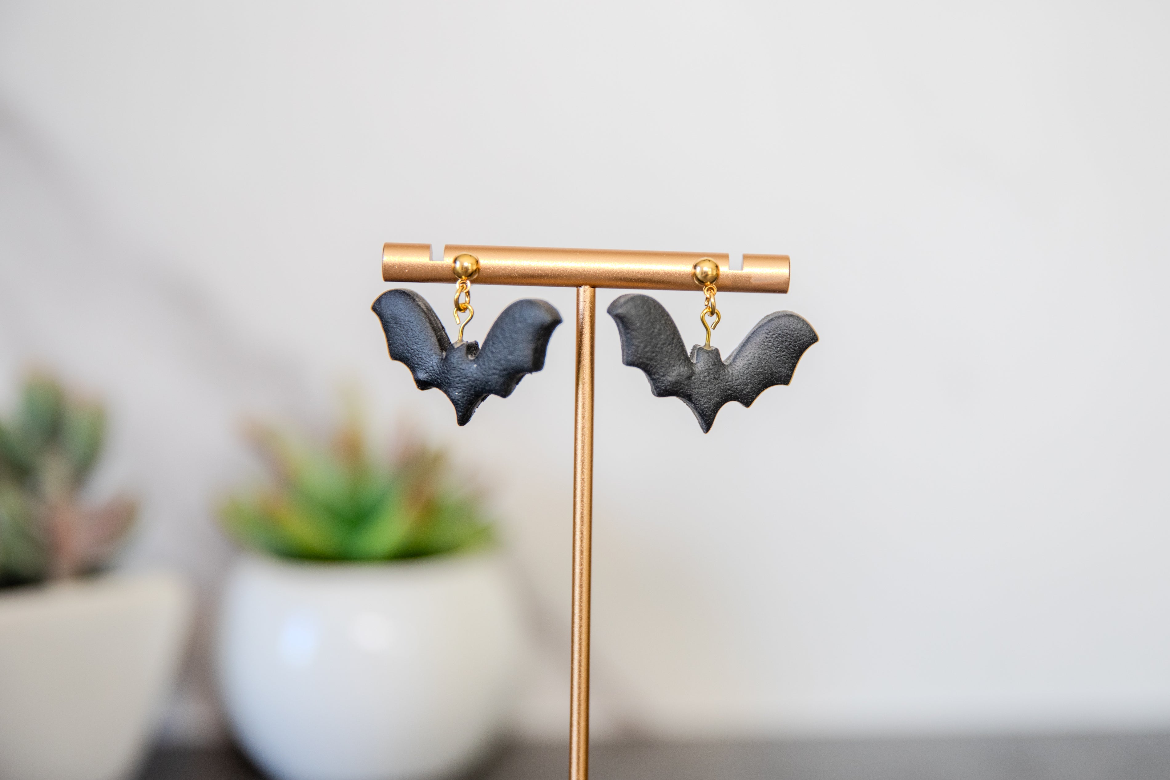 Black bat drop earrings