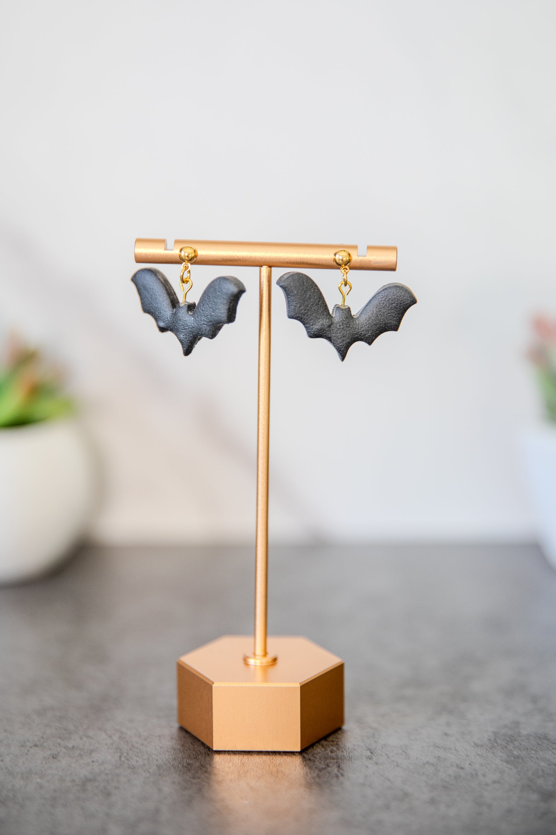 Black bat drop earrings