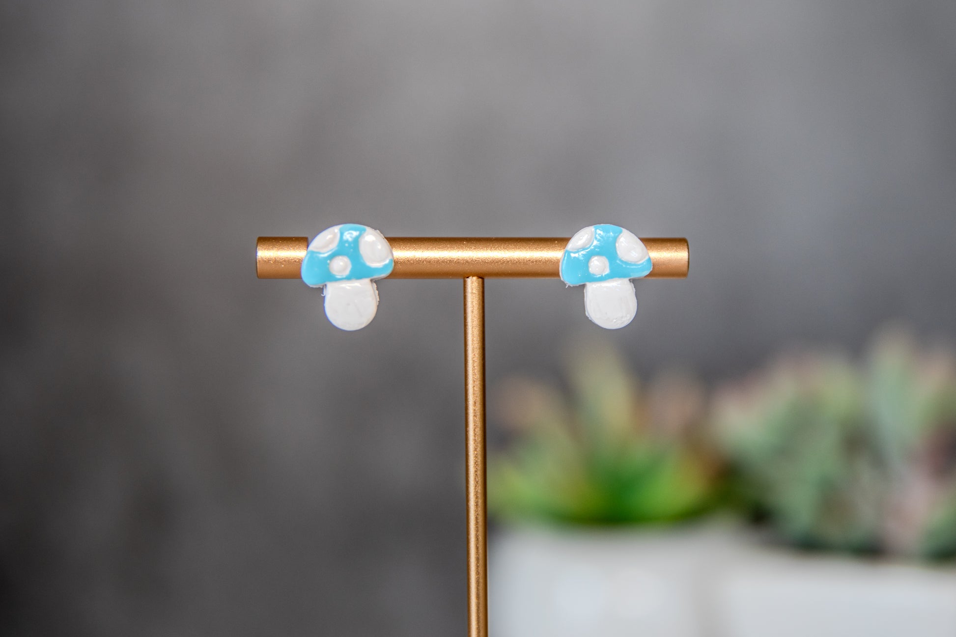 Blue colored toadstool stud earrings