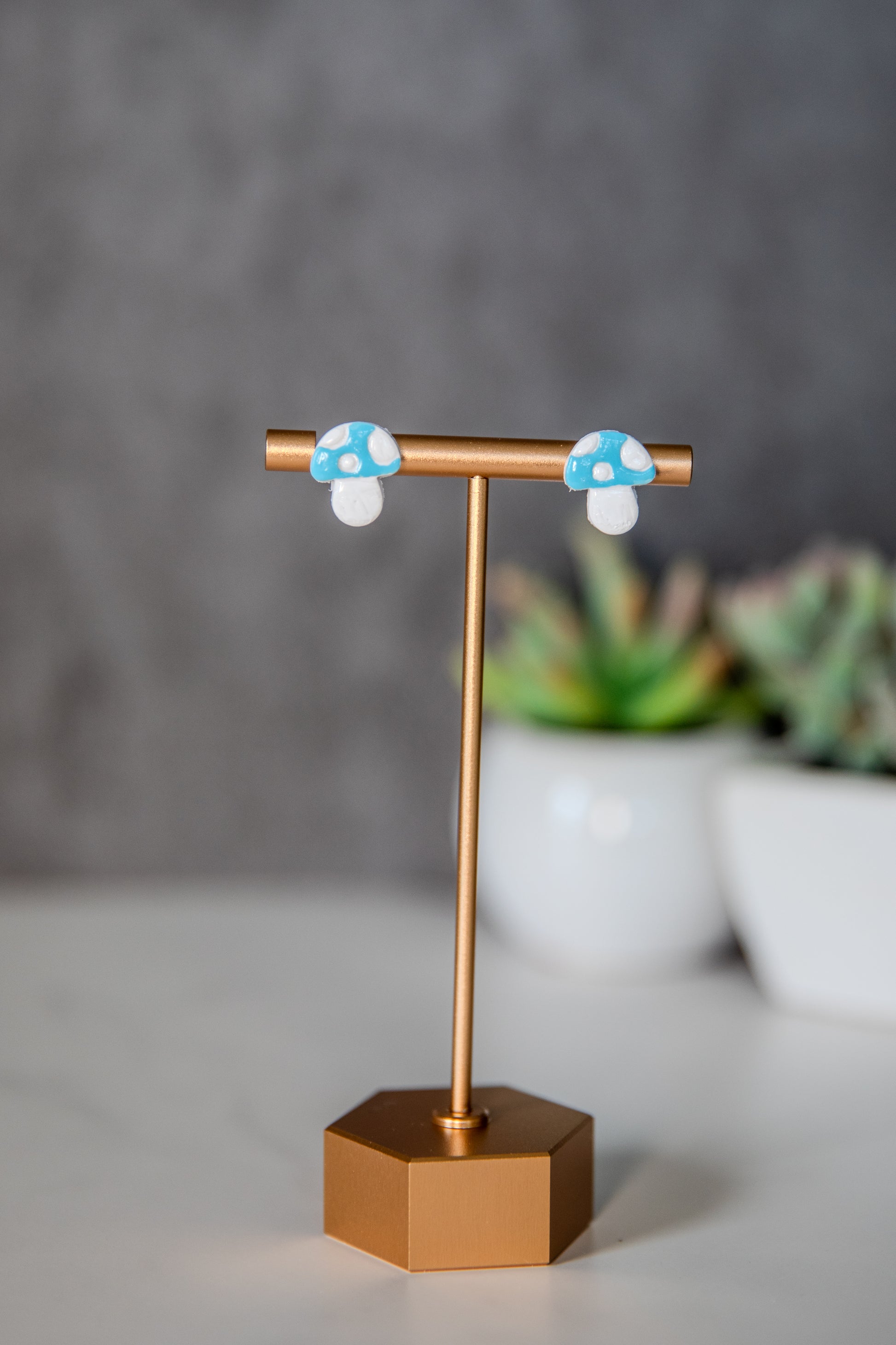 Blue colored toadstool stud earrings