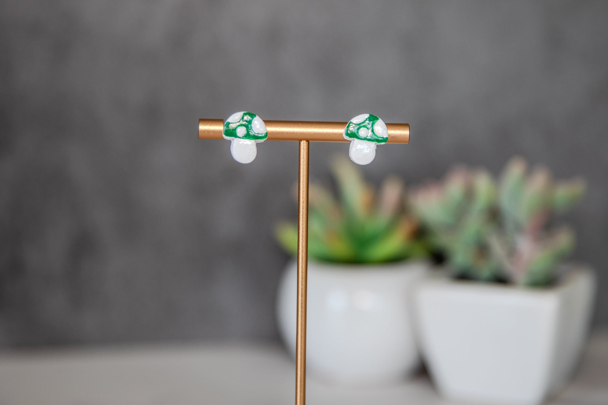 Green colored toadstool stud earrings
