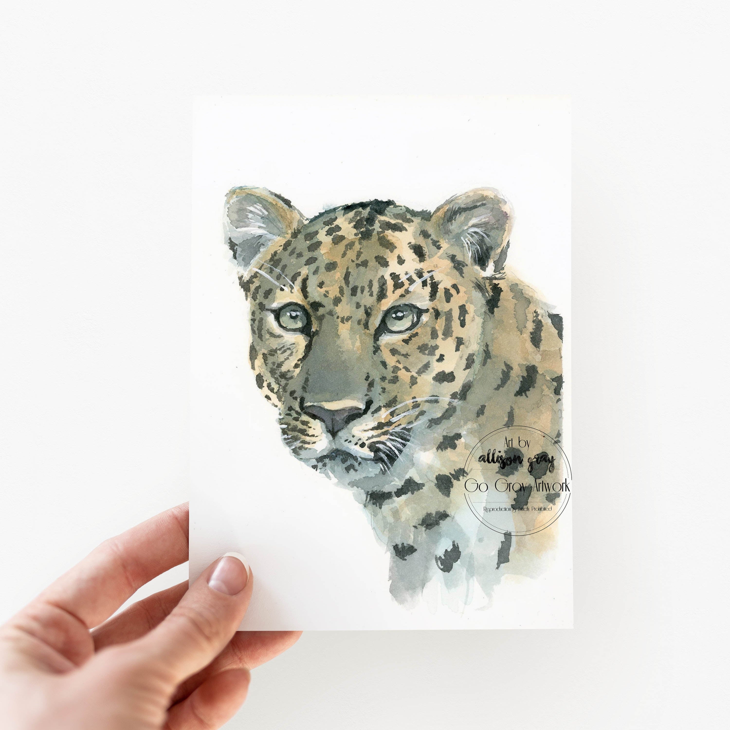 Watercolor painting of an Amur leopard