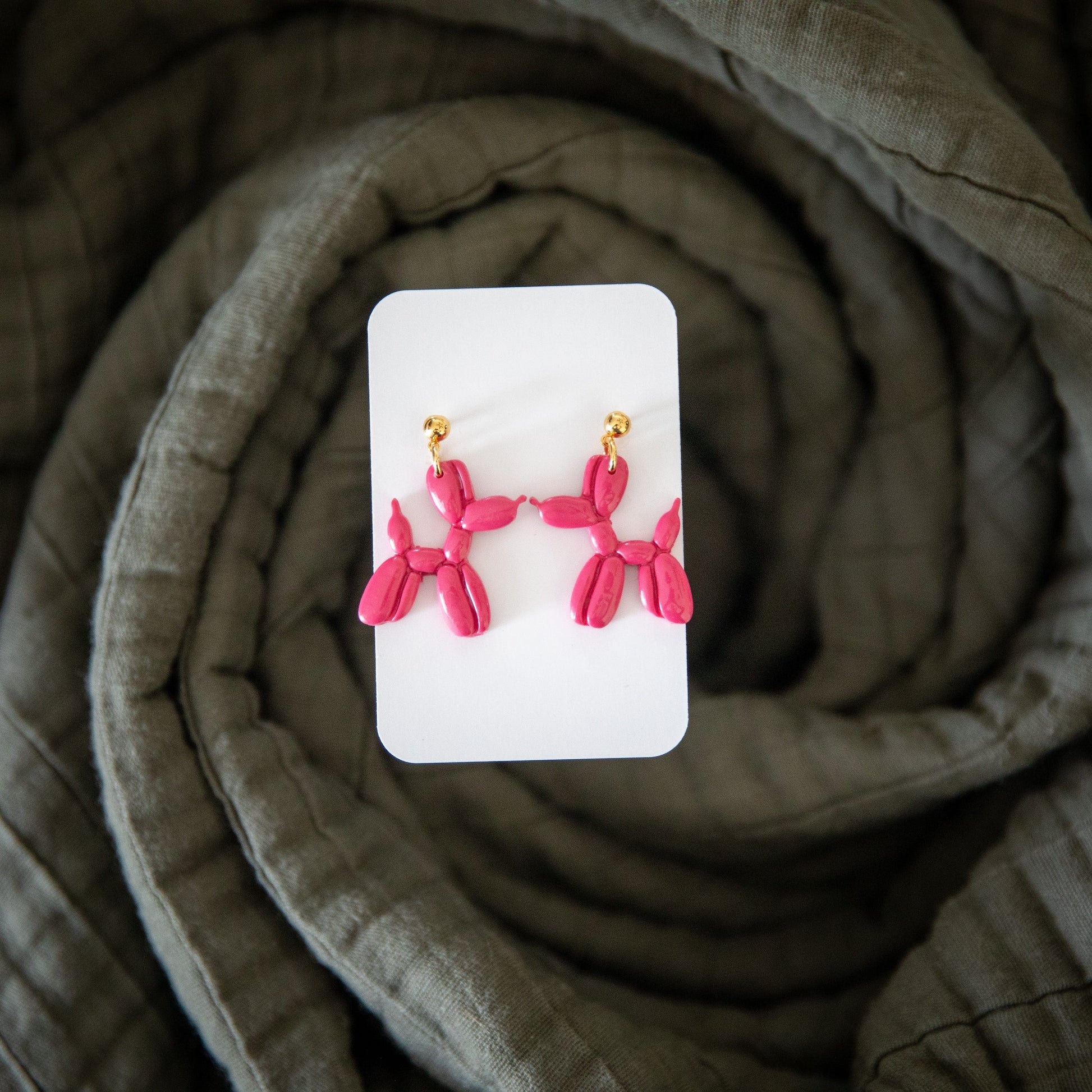 Pink balloon animal earrings