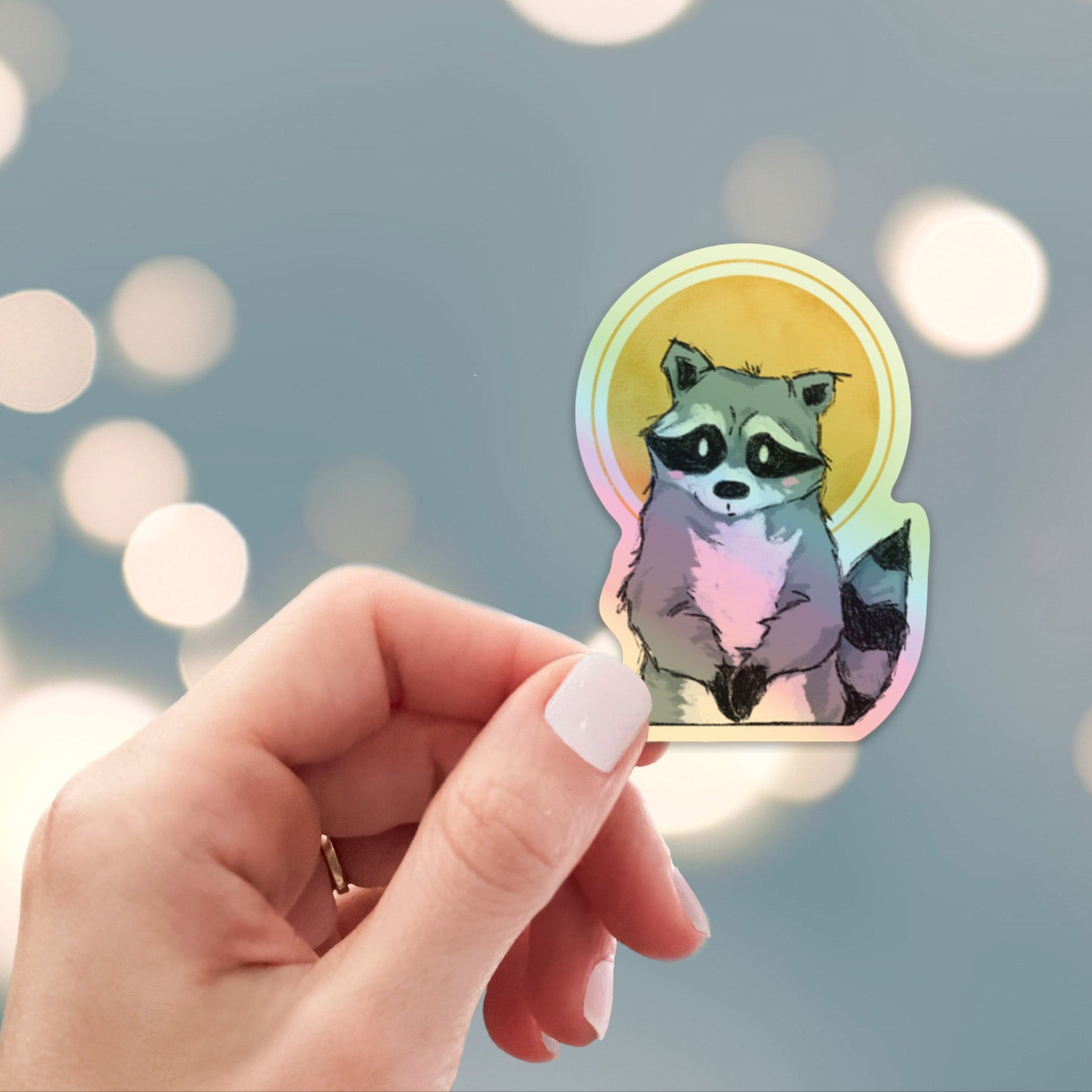 Holographic saint raccoon sticker