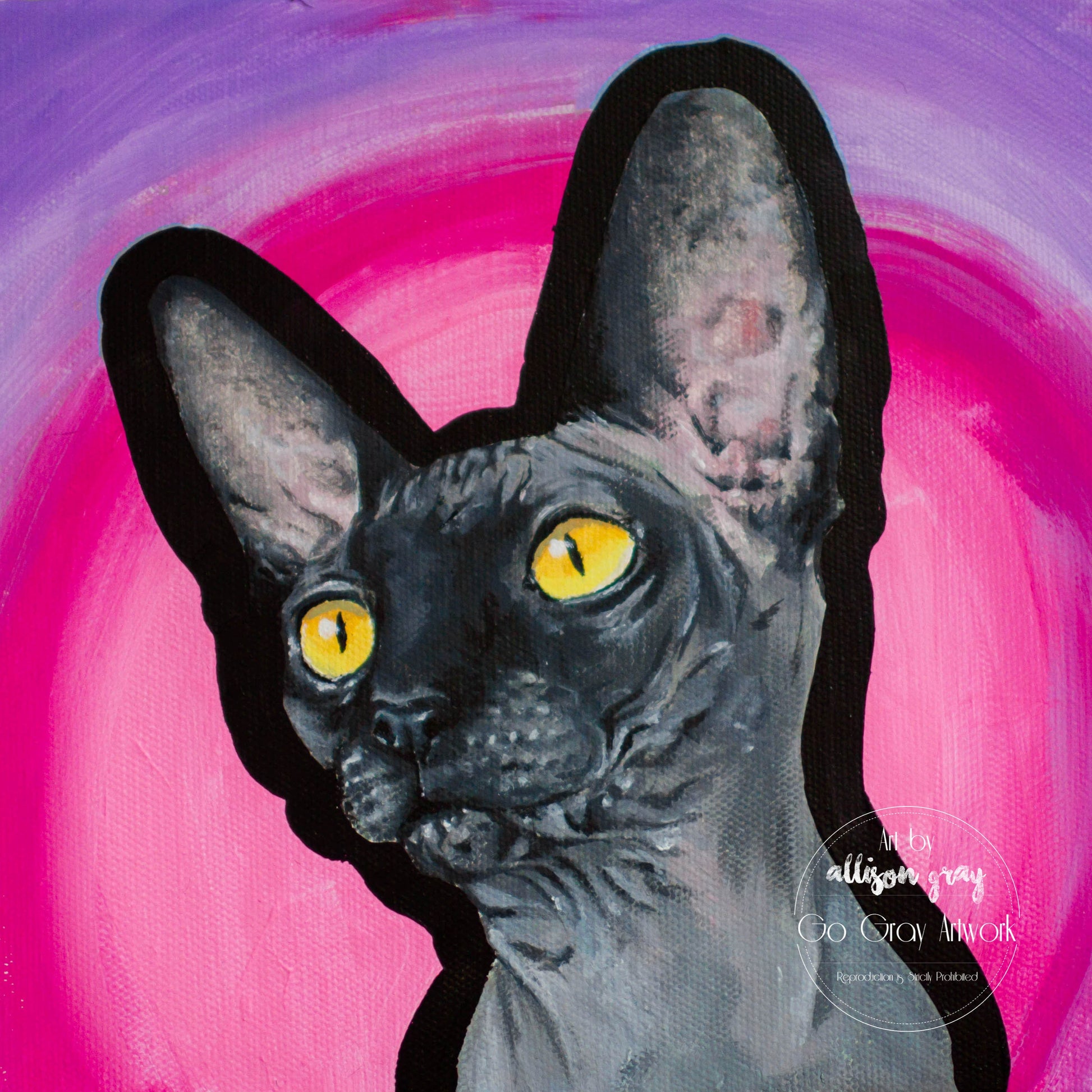 Canvas print of a Sphynx cat with a pink and purple abstract background on a wooden surface.