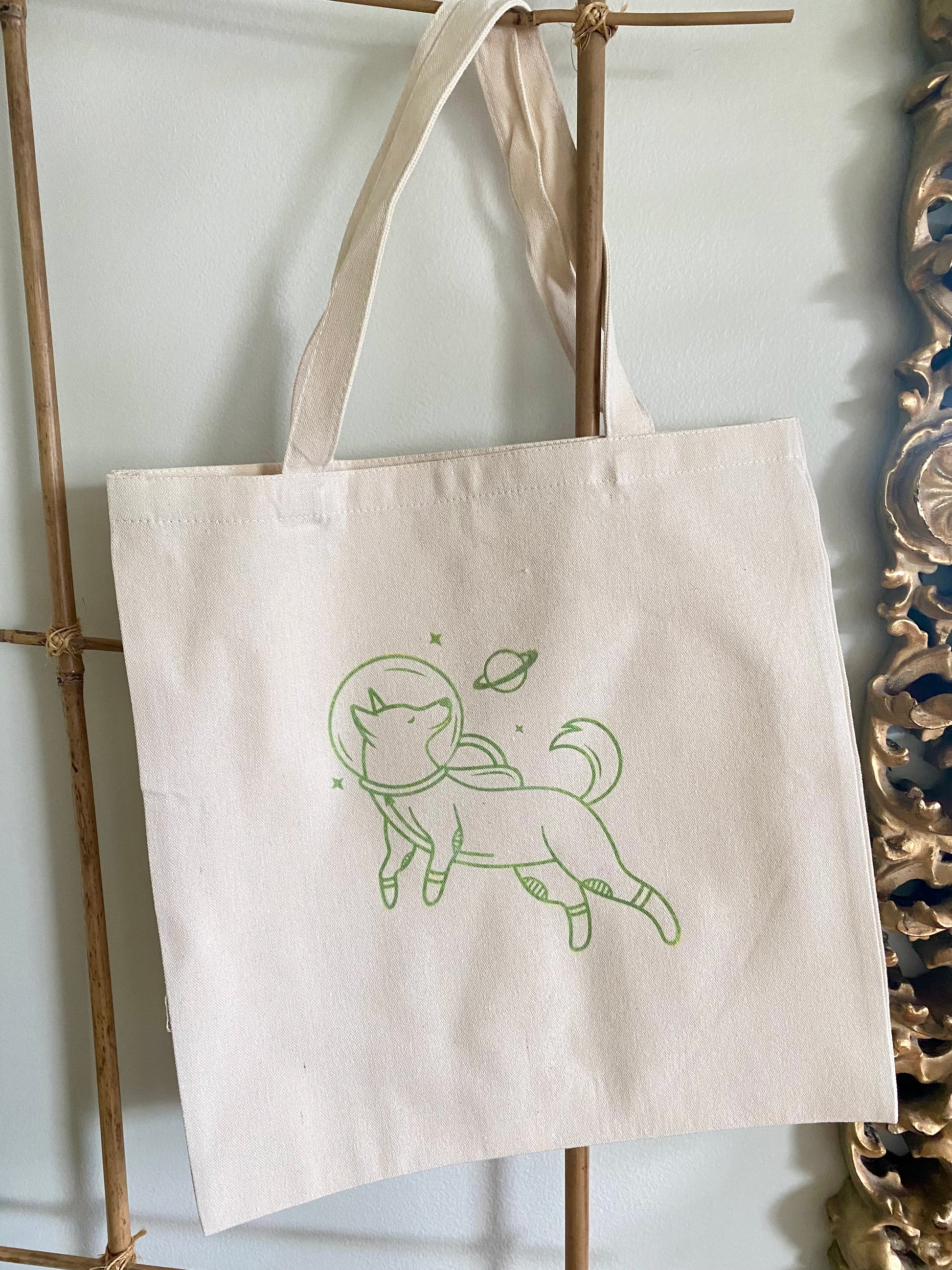 Space dog tote bag