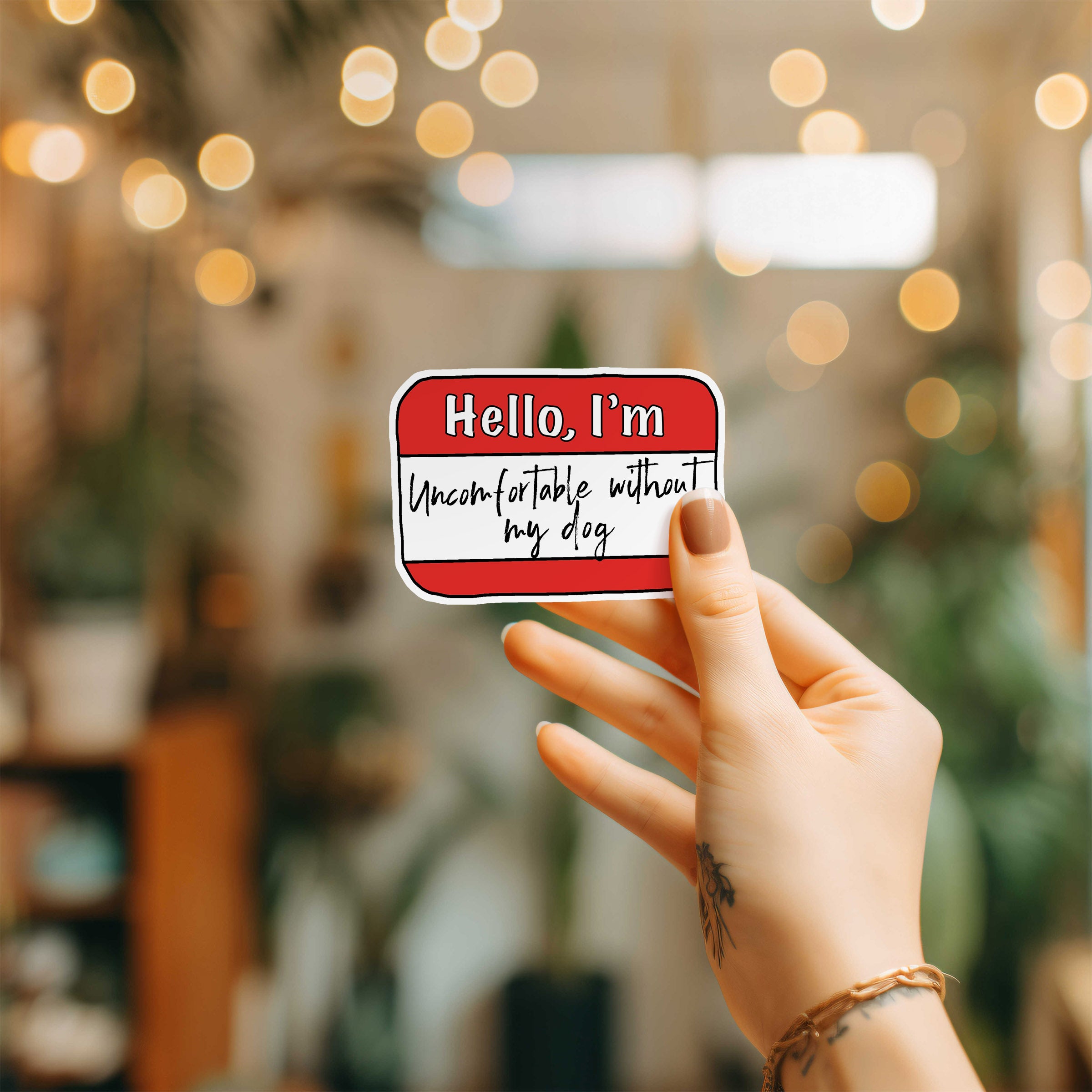 sticker name tag sticker with text 'Hello, I'm uncomfortable without my dog' 