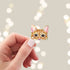 Peeking orange tabby cat sticker