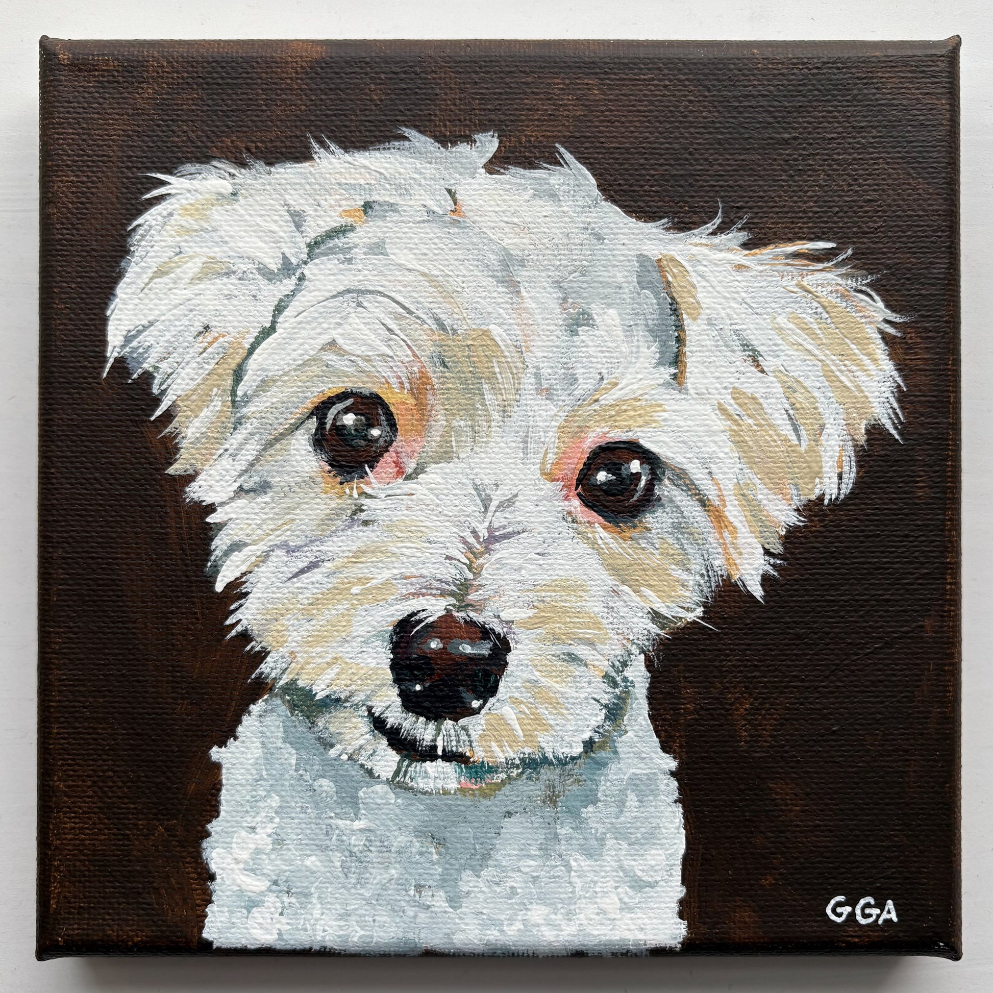 Canvas painting of a dog's face with a dark brown background