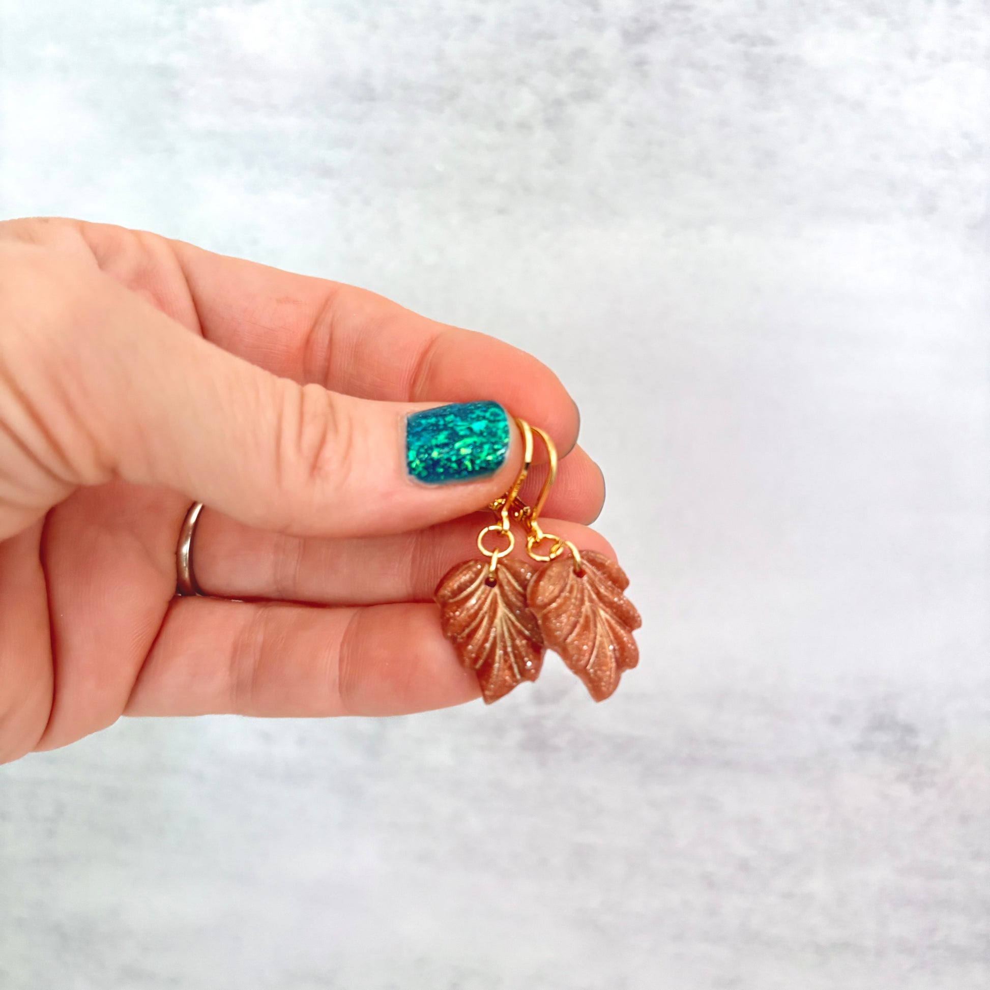 Shimmery brown leaf drop earrings with gold findings
