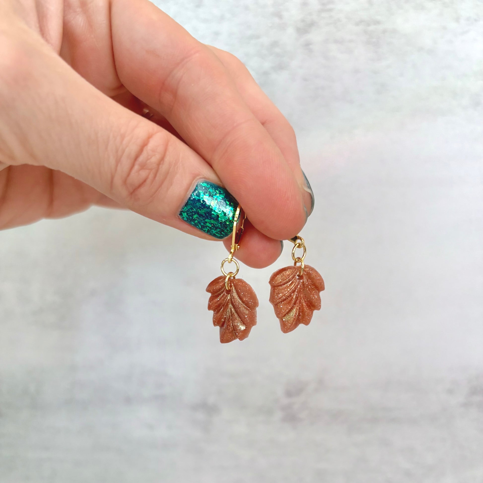 Shimmery brown leaf drop earrings with gold findings