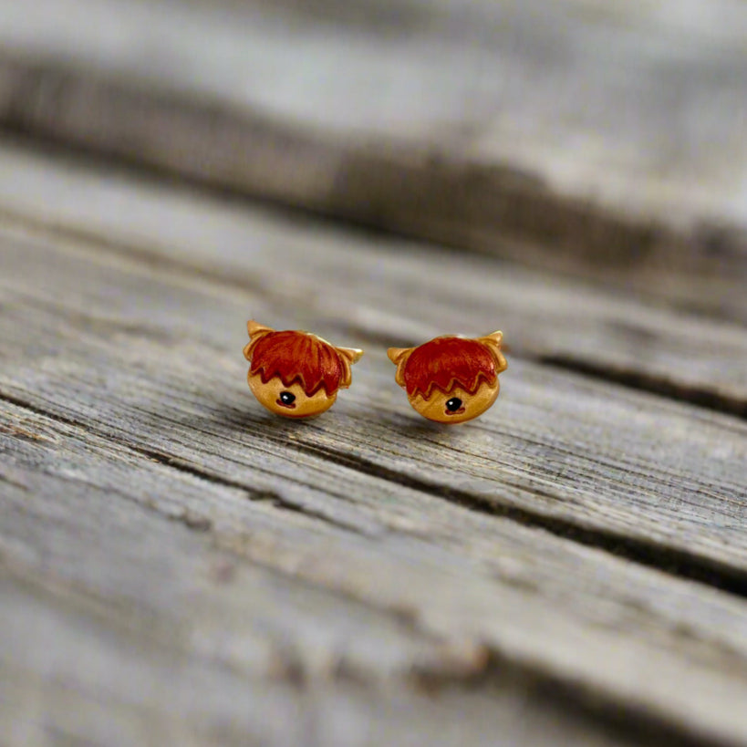 Pair of small earrings of highland cows
