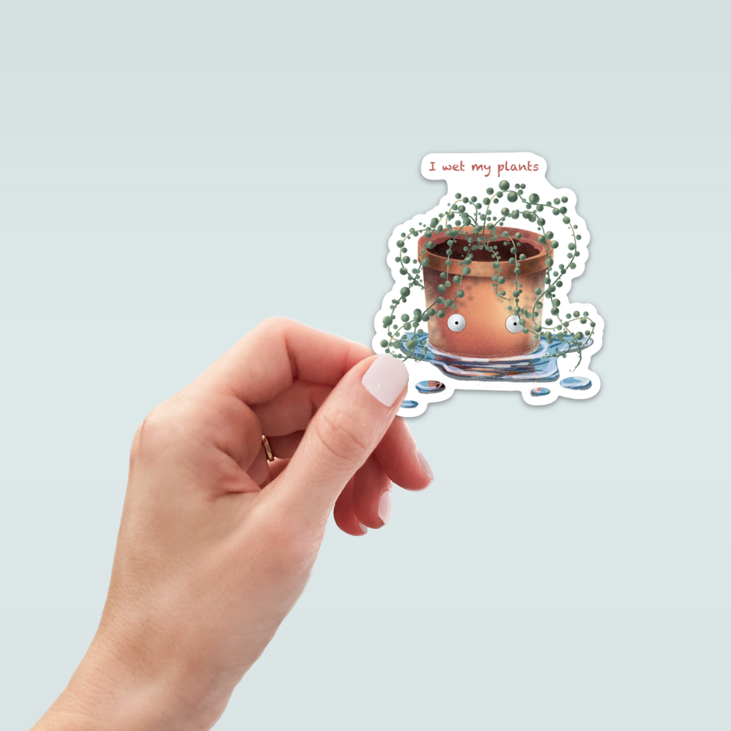 sticker with a potted plant design and text 'I wet my plants'